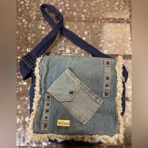 Classic Blue Denim Crossbody Bag/Satchel style with Fringe. Numerous pockets
